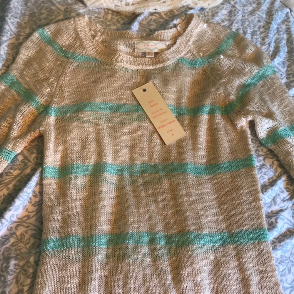 Cute off- white sweater!